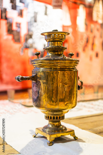 Photography Russian brass samovar featuring intricate details, polished finish, ornate spout