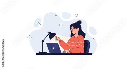 Young Woman Working on Laptop at Desk Under Desk Lamp, Concept of Study, Work from Home, or Creative Process