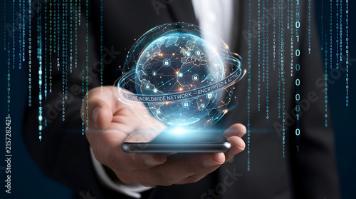 Business professional holding glowing digital Earth with global network data connections and futuristic tech