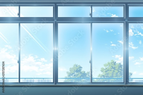 窓から見える青空と木々の風景