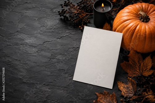 Halloween invitation card mockup with pumpkin and copy space