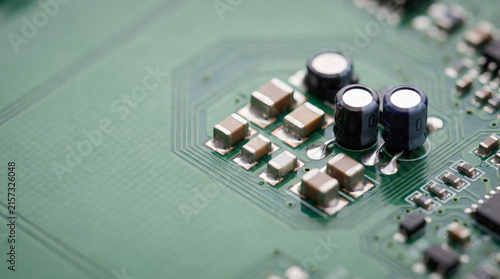 Obraz na płótnie Electronic components on green circuit board