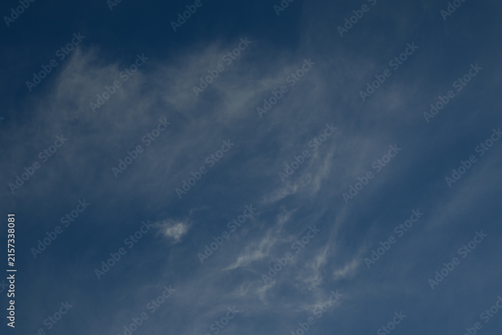 Fototapeta premium Wispy White Clouds in a Blue Sky