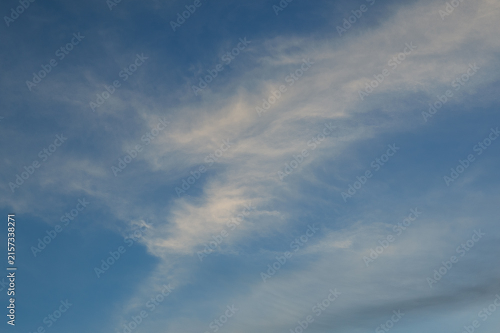 Obraz premium Wispy White Clouds in a Blue Sky
