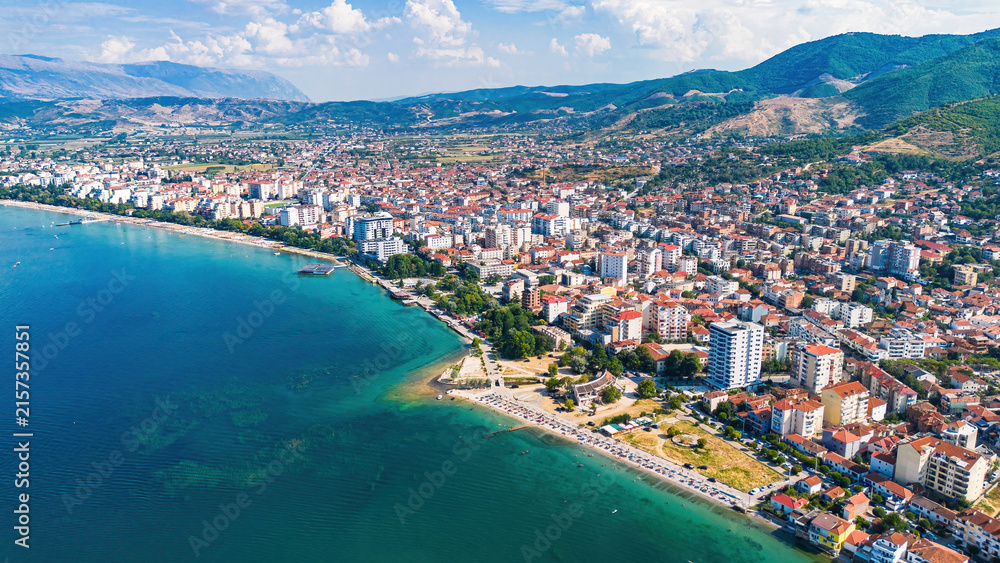 Fototapeta premium Aerial view of Pogradec, Albania, nestled on the shores of Lake Ohrid