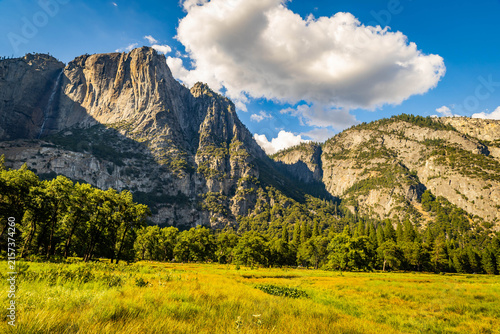 Yosemite Falls cascades from Sierra Point sunset