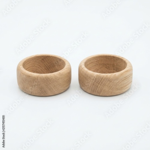 Set of wooden napkin rings on neutral background