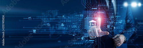 Bank executive touch of smart Banking circuit board and analyzing live global market transactions on a secure virtual terminal. Securing financial stability for worldwide institutions.