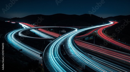 Canvastavla Highway traffic light trails winding through mountain pass at