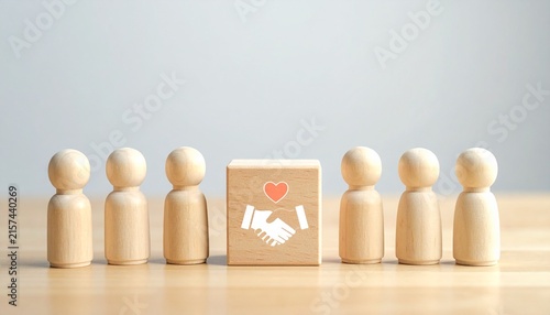 Wooden Figures Representing Unity and Mutual Understanding Within a Collaborative Team Environment