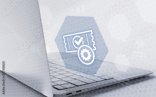 Fotografía Digital laptop concept displaying a ticket configuration icon with a gear and checkmark, representing automated ticketing system management, technical support, and setup options
