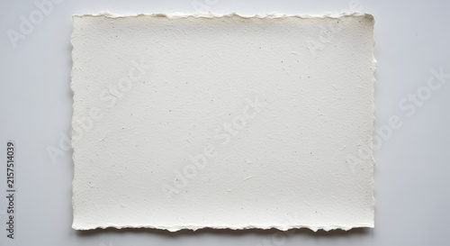 Rough textured white paper background with torn edges, blank copy space