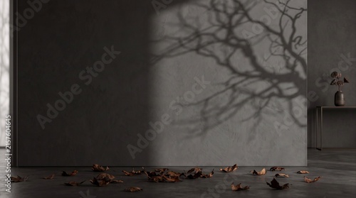 Spooky tree shadow on dark wall with autumn leaves for Halloween background