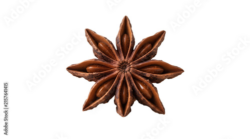 A single dried star anise spice pod isolated on a solid black background for culinary photography