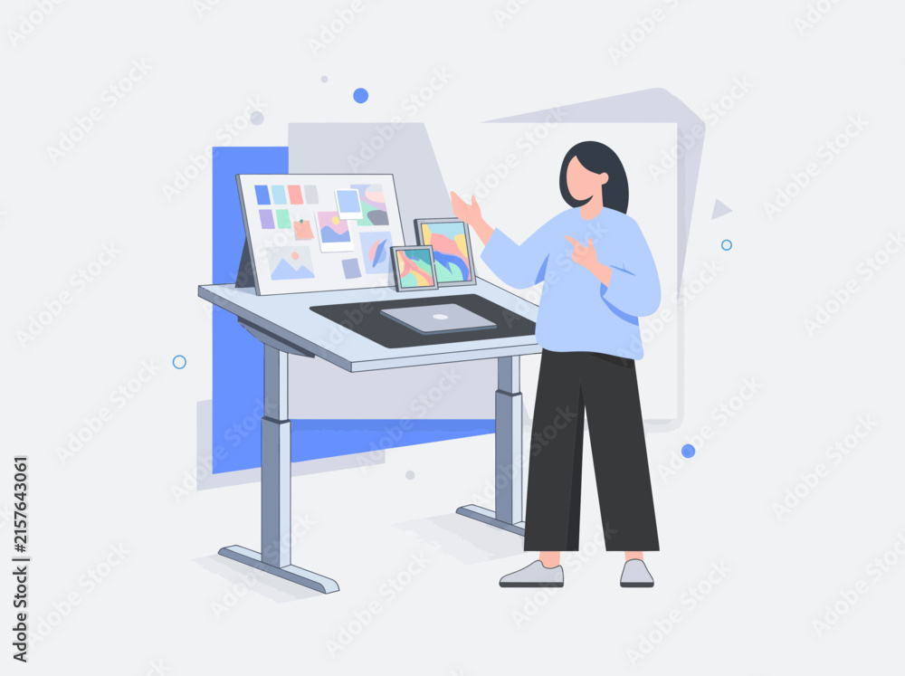 Fototapeta premium A woman presents her digital art project while standing at a modern desk with screens and mood boards