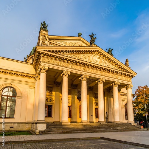 Historic neoclassical courthouse with grand columns and dome.