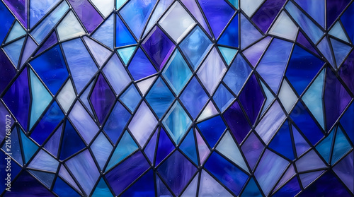 Vibrant blue stained glass geometric facets forming intricate diamond pattern design