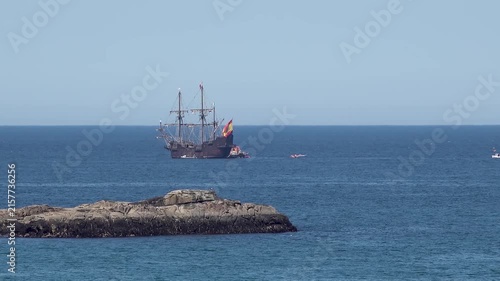 Historic Galleon with Spanish flag sailing close to the coast of Ireland in County Donegal