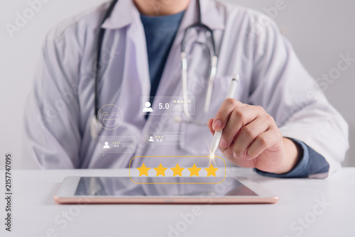 Patient Satisfaction Doctor Selecting Five Star Healthcare Rating on Tablet