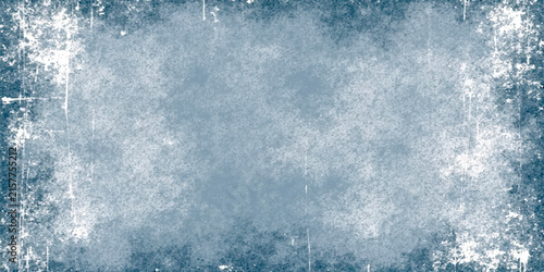 Foto Textured frosty ice vignette border with a grunge distressed winter abstract bac