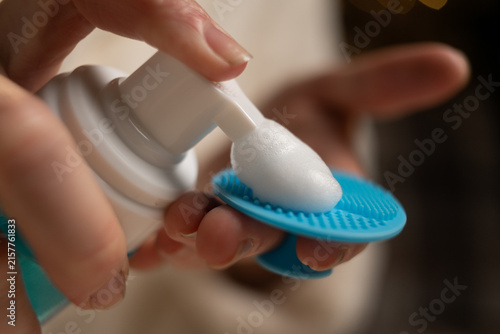 Cuadro en lienzo Close up of facial cleansing foam being dispensed onto a silicone sponge for skin cleansing and acne care