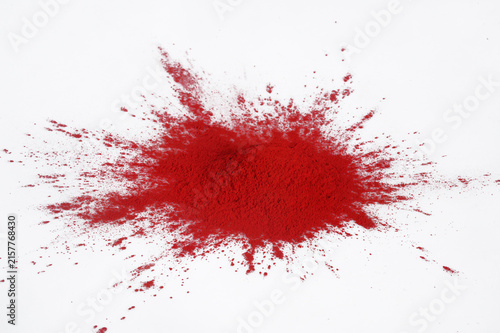 red pressed powder on white background