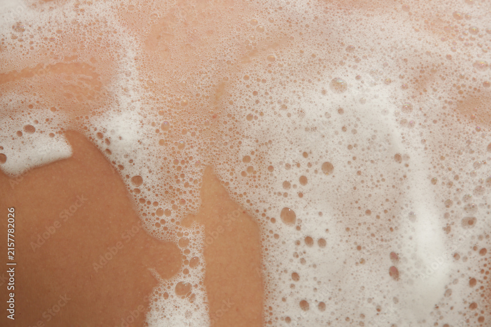 Fototapeta premium Close Up of Bath Foam on Skin During Bathing