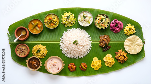 Traditional South Indian Onam Sadhya Feast with Vegetarian Dishes Served on Banana Leaf, Overhead View, Kerala Cuisine
