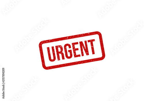 Red urgent rubber stamp imprint on paper