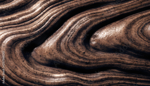 A very dark and brown swirl pattern
