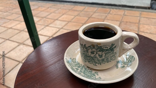 Obraz na płótnie cup of coffee on wooden table