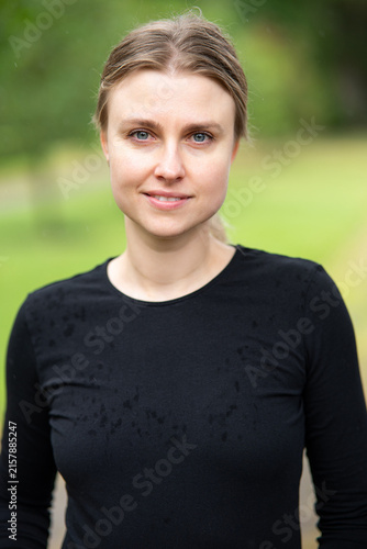 Portrait of beautiful smiling blonde young woman 