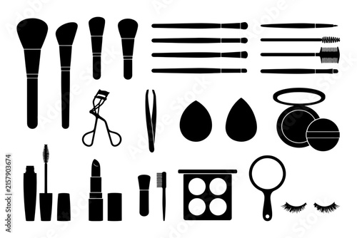 Variety of makeup tools and accessories collection.