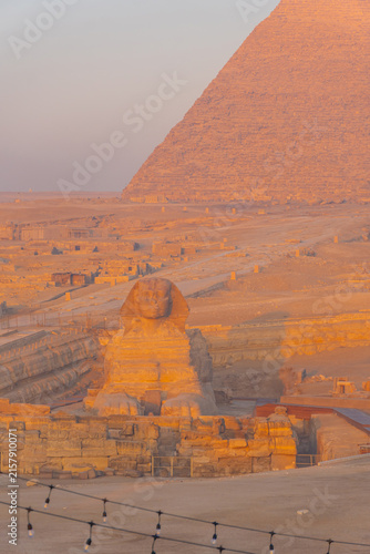 The Great Sphinx and the iconic Pyramid of Khafre in the Giza desert landscape