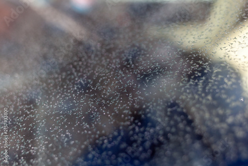 Konstfotografi Close-up image of a textured surface featuring numerous tiny particles and refle