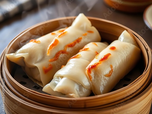 Golden brown scallion pork rolls steaming in bamboo steamer, comfort food, ||pork