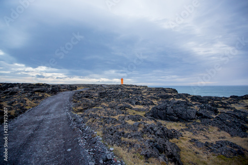 Lighthouse in lava field in beautiful nature in Snaefellsjokull National Park in Iceland, autumntime