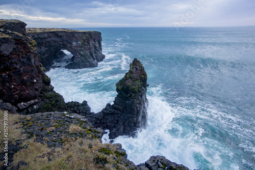 Big rocks and waves in beautiful nature in Snaefellsjokull National Park in Iceland, autumntime