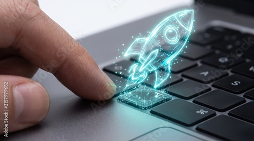 Finger pressing a keyboard key with a glowing rocket launching into the digital space