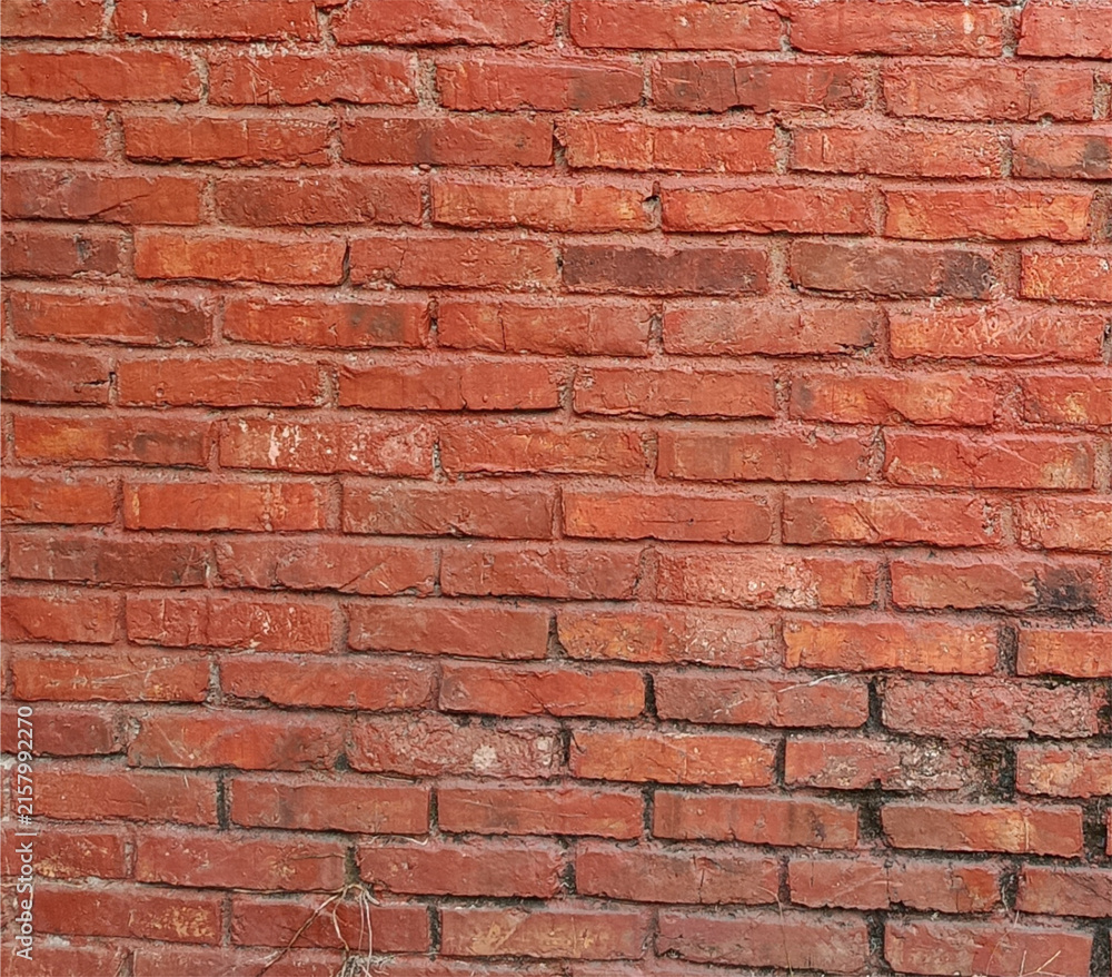 Fototapeta premium Textured red brick wall background full frame surface texture