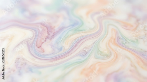 Soft pastel marble swirl texture in cream pink blue