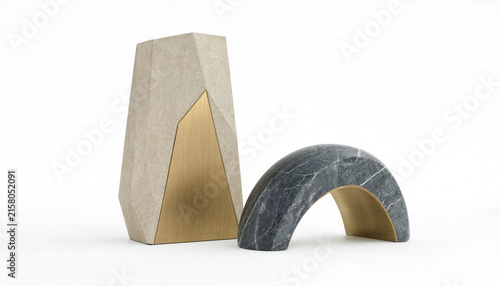 фотографія Set of two decorative sculptures featuring a tall geometric beige stone piece an