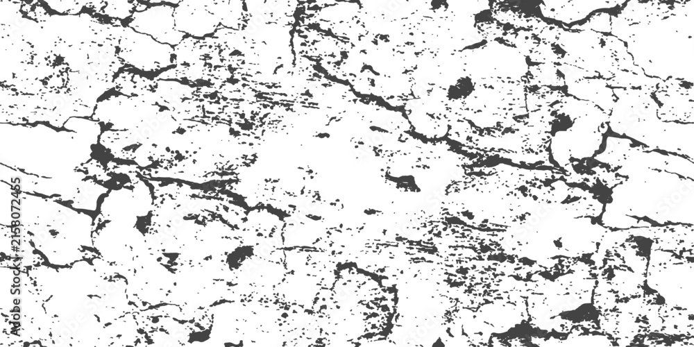 Fototapeta premium Cracked dry earth texture with deep fissures and rough surface during harsh sunlight with a gritty feel