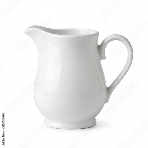 White ceramic creamer pitcher, classic porcelain milk jug, elegant kitchen tableware isolated on white background