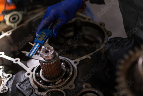 car mechanic repairing a car