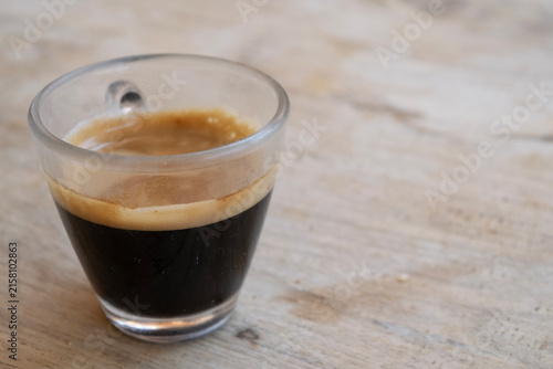 Espresso coffee cup on wooden table
