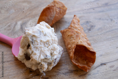 Sicilian cannoli cream preparation on wood