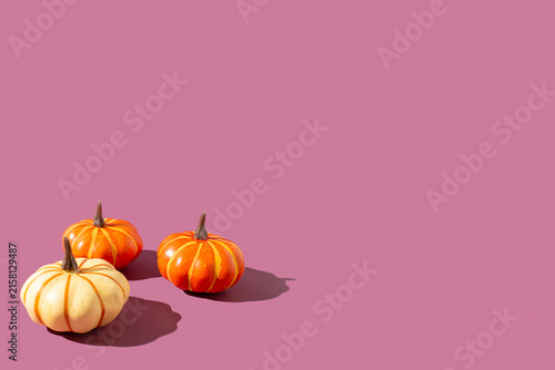 Fotografía Pumpkin on a purple background with copy, Halloween or  fall vegetable concept