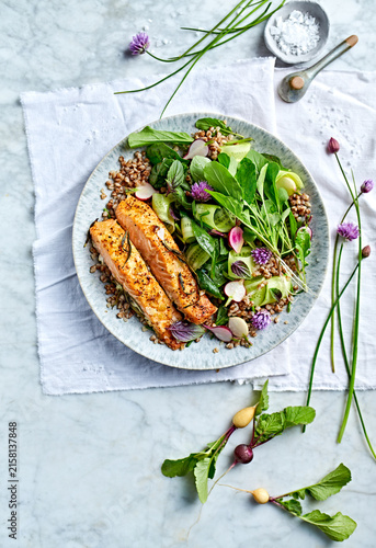Baked salmon fillet with buckwheat and fresh garden salad