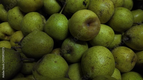 Fresh Pears in market , in night  , slow motion